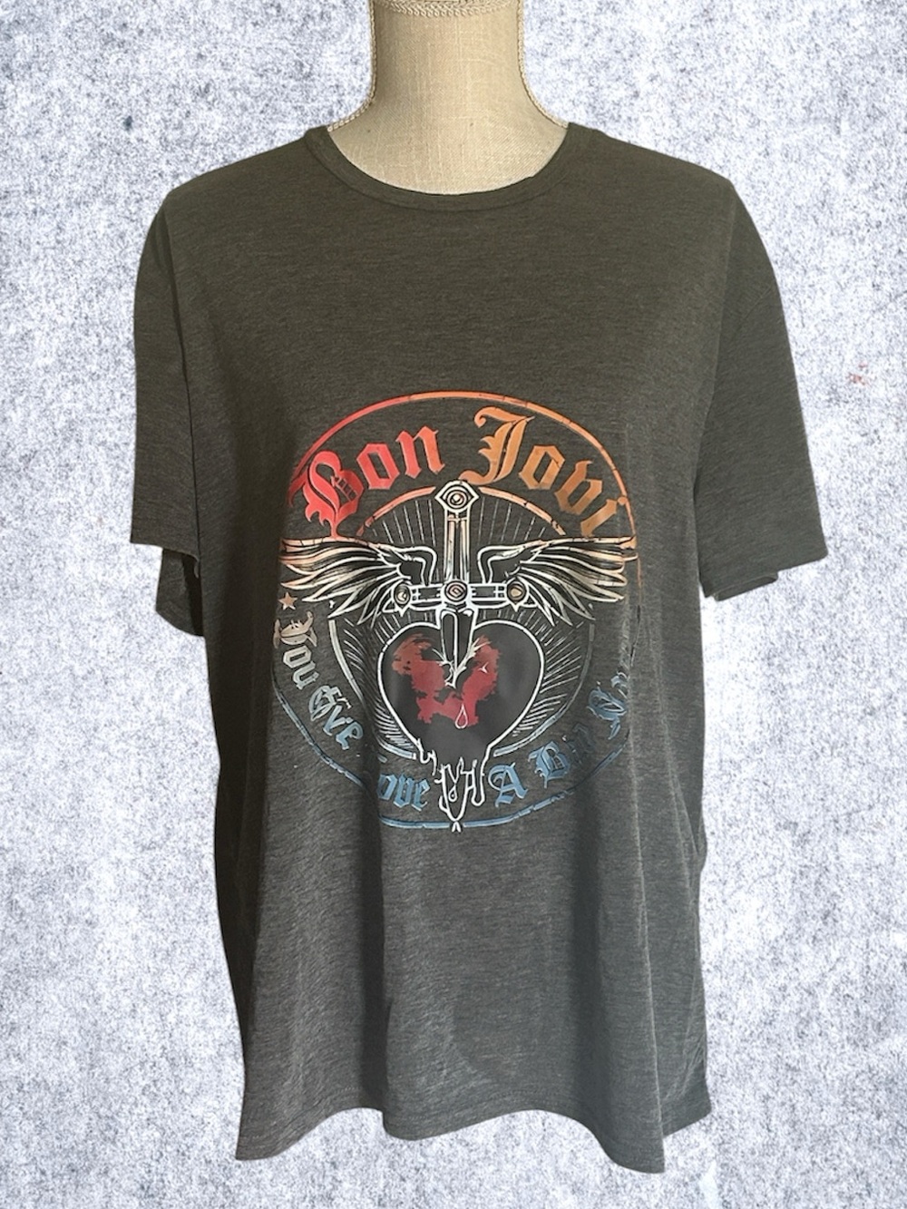 Bon Jovi graphic t-shirt featuring the iconic distressed heart, dagger, & wings